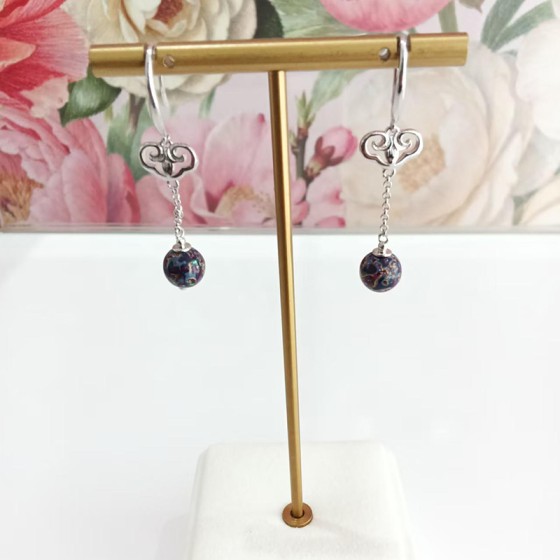 Ink beads entwined with clouds